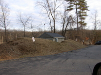 Before upgrade, burried 10,000 gal tank & concrete pump station